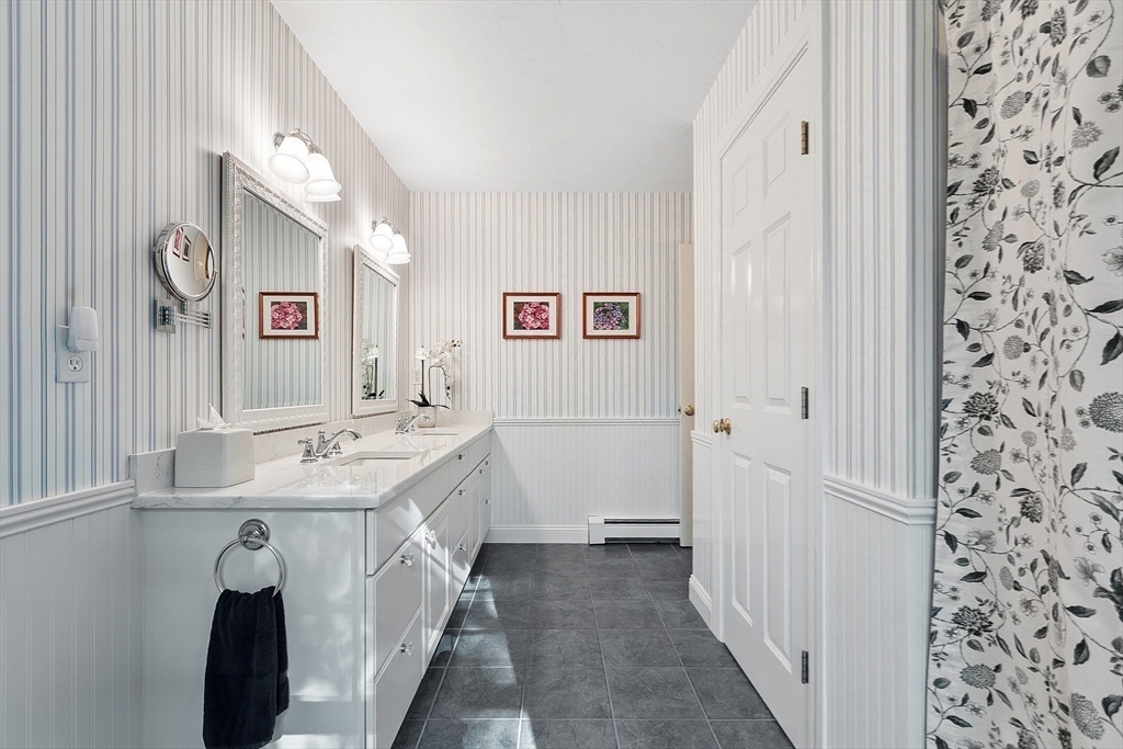 2 Taymax Road Westminster, MA 01473 - Photo 31 of 41 a hallway with a sink and a refrigerator