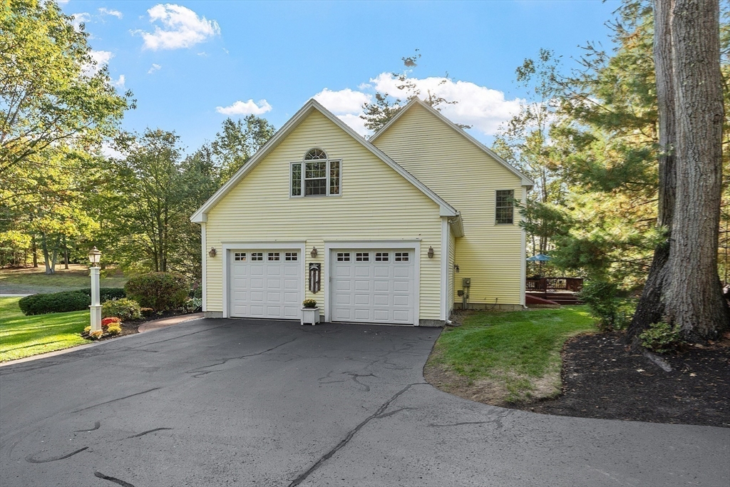 2 Taymax Road Westminster, MA 01473 - Photo 39 of 41 a view of a house with a yard and garage