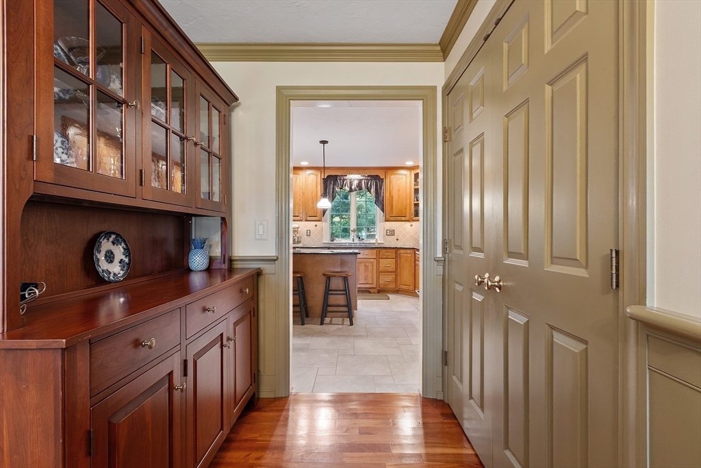 2 Taymax Road Westminster, MA 01473 - Photo 7 of 41 a kitchen with stainless steel appliances granite countertop a stove and a wooden cabinets