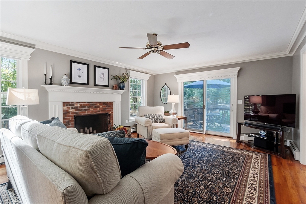 2 Taymax Road Westminster, MA 01473 - Photo 10 of 41 a living room with furniture a flat screen tv and a fireplace