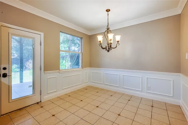 a view of an empty room with window