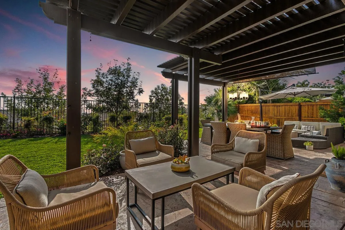 1014 Bellingham Drive Oceanside, CA 92057 - Photo 2 of 33 a view of a patio with couches potted plants and a big yard
