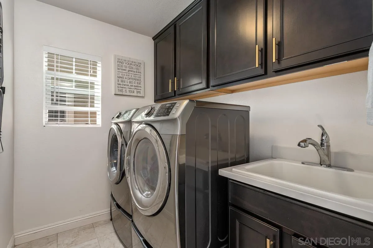 1014 Bellingham Drive Oceanside, CA 92057 - Photo 25 of 33 a utility room with dryer and washer