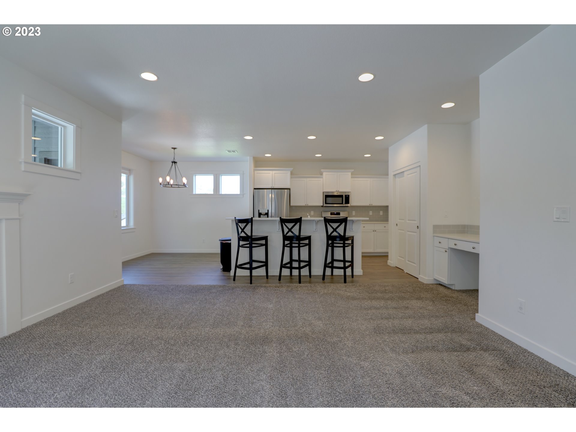 2601 Ericksen Way The Dalles, OR 97058 - Photo 8 of 37 a view of a kitchen with a table and chairs