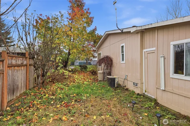 a house view with a backyard space