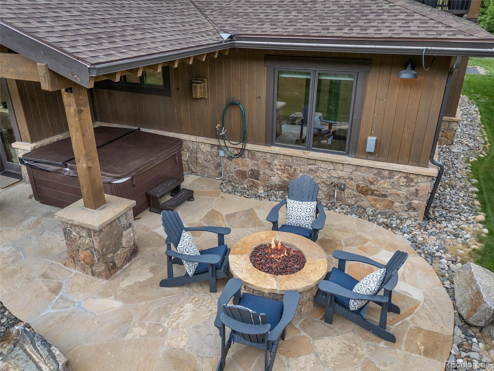 30 Wolf Rock Road Keystone, CO 80435 - Photo 16 of 39 a backyard of a house with table and chairs