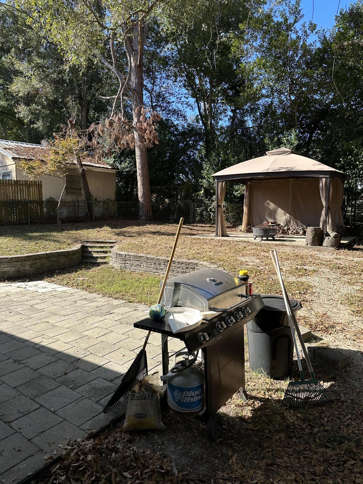 111 Sikes Drive Crestview, FL 32539 - Photo 19 of 20 a view of a backyard with chairs