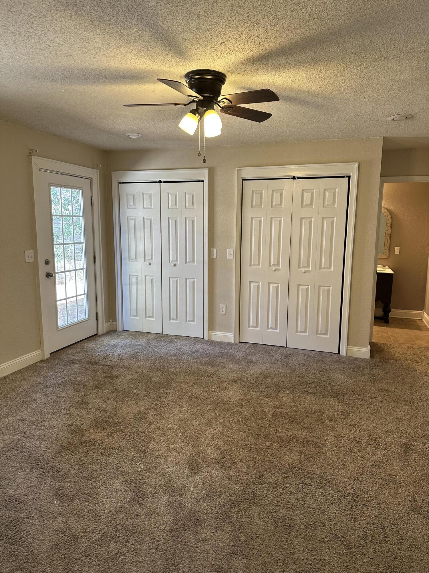 111 Sikes Drive Crestview, FL 32539 - Photo 9 of 20 a view of an empty room with a window