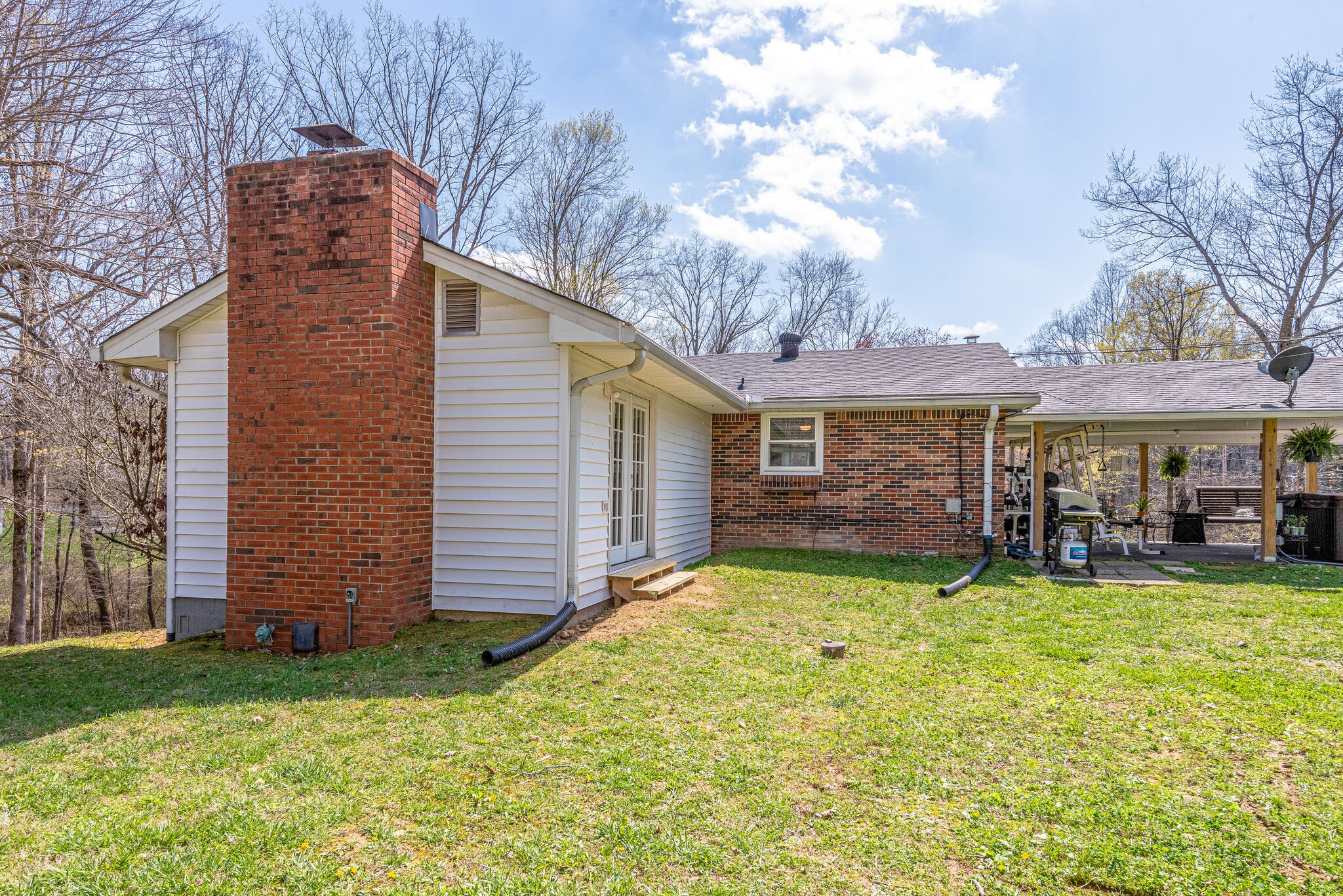 1065 Oak Grove Road Dickson, TN 37055 - Photo 23 of 30 a view of a house with a yard and sitting area
