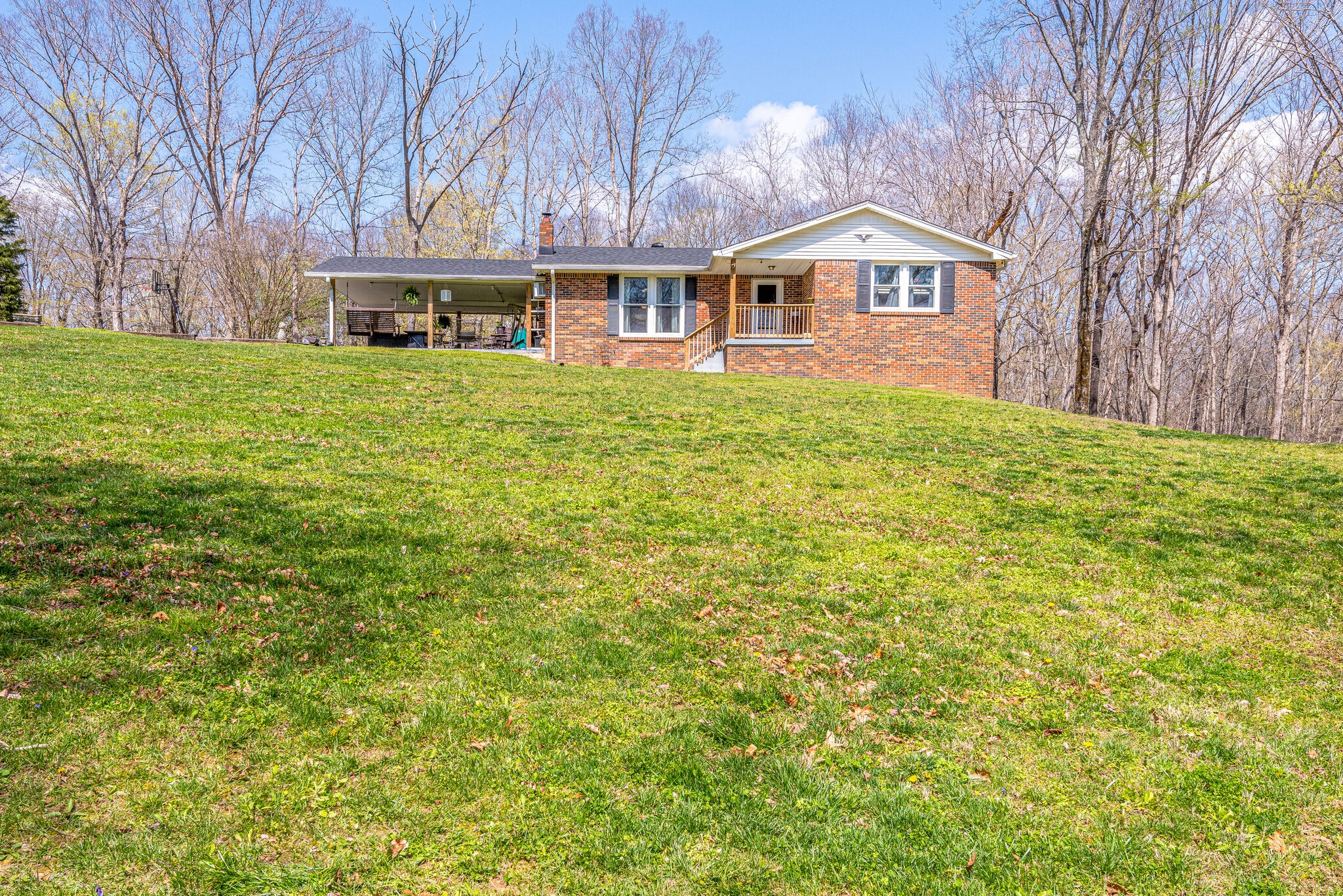 1065 Oak Grove Road Dickson, TN 37055 - Photo 26 of 30 a view of a house with a big yard and large trees