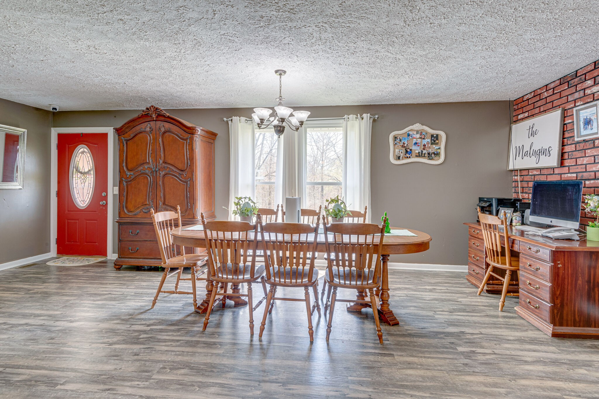 1065 Oak Grove Road Dickson, TN 37055 - Photo 3 of 30 a view of a dining room with furniture window and wooden floor