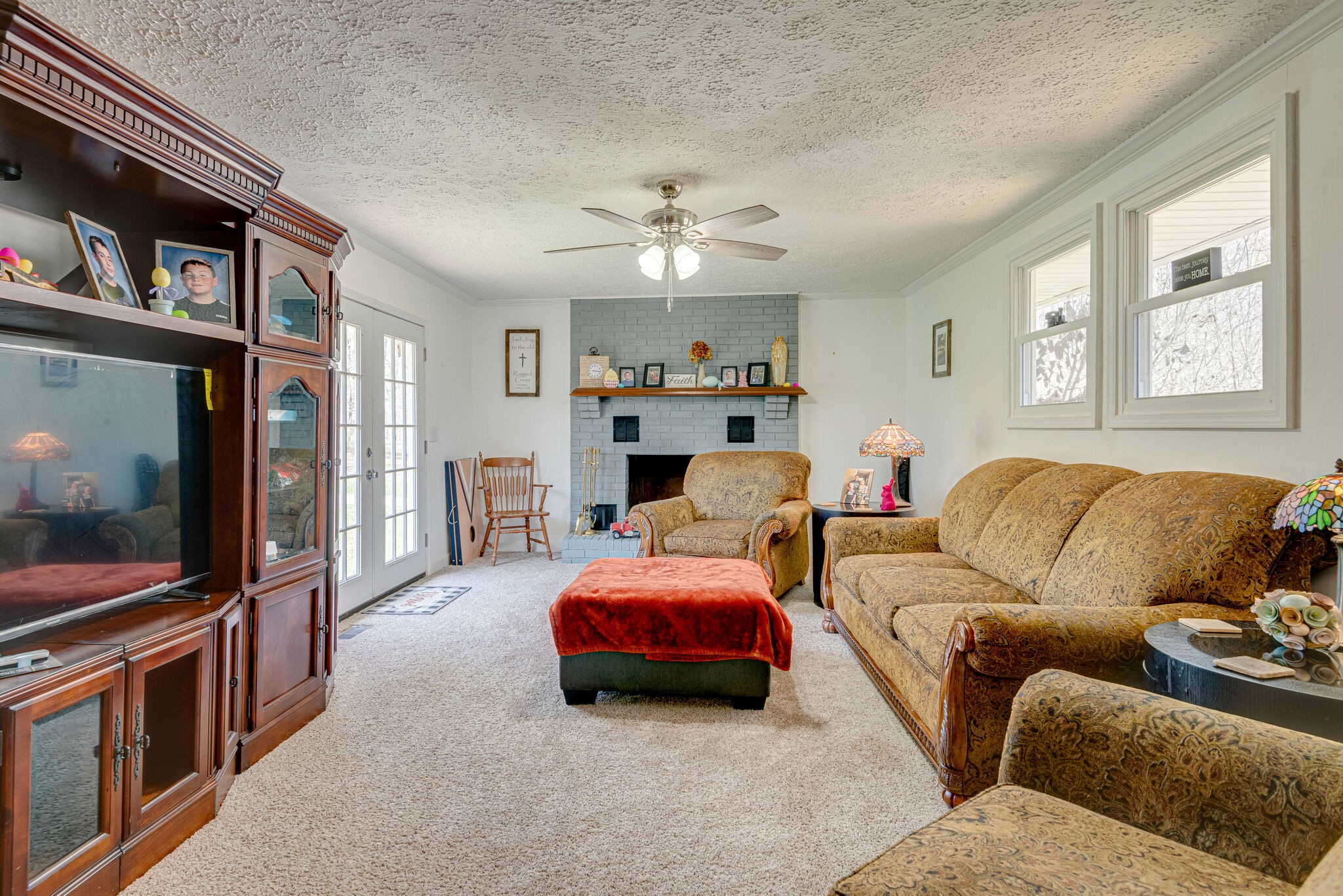 1065 Oak Grove Road Dickson, TN 37055 - Photo 10 of 30 a living room with furniture and a flat screen tv