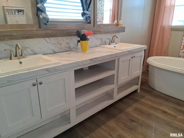 a bathroom with a sink and a toilet