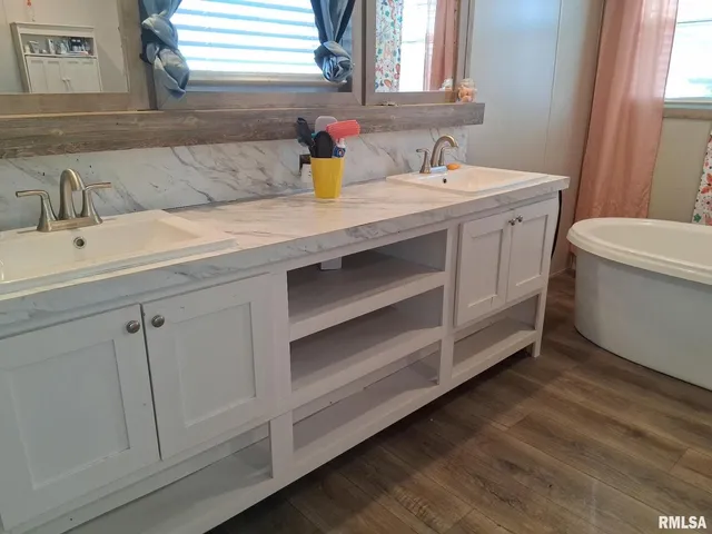 a bathroom with a sink and a toilet