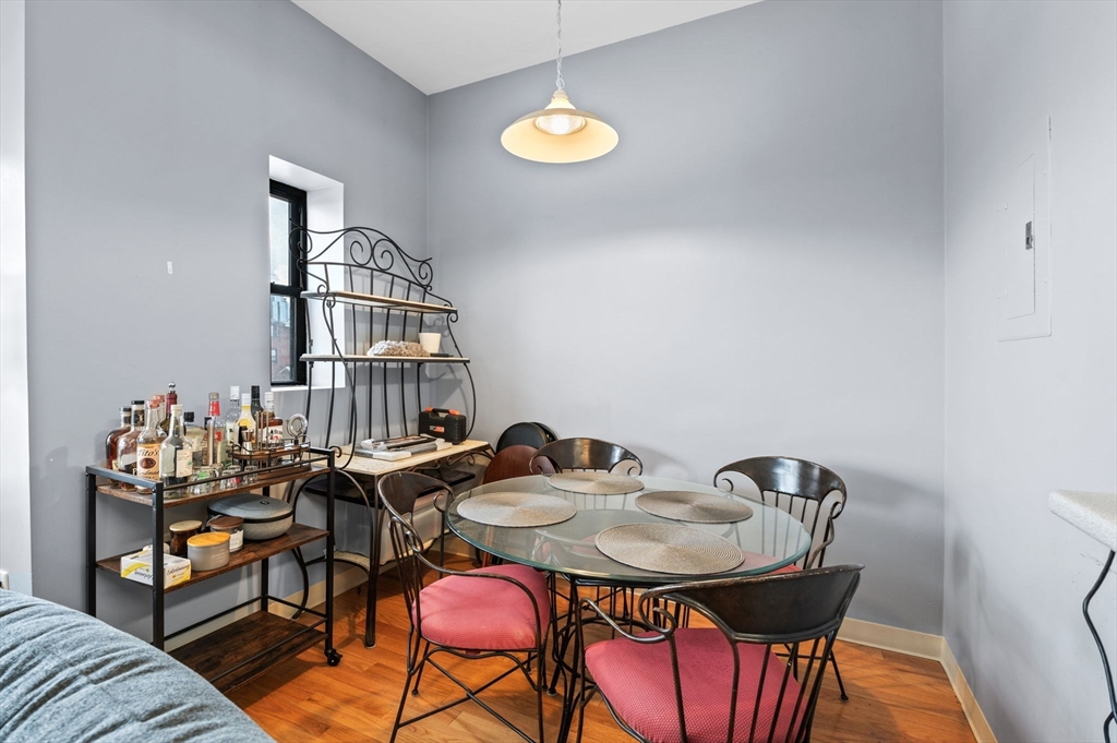 636 Beacon Street, Unit 605 Boston, MA 02215 - Photo 7 of 23 a view of a dining room with furniture and window