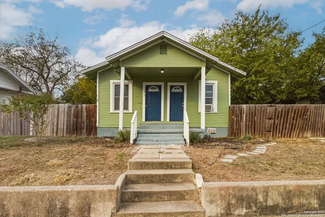a front view of a house with a porch