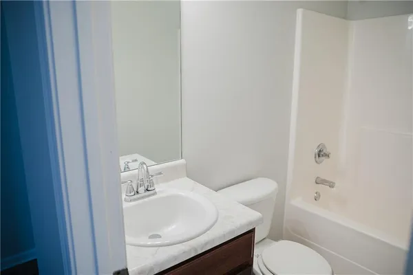 a bathroom with a sink and a toilet