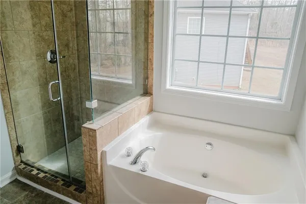 a bathroom with a bathtub