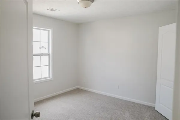 an empty room with a window