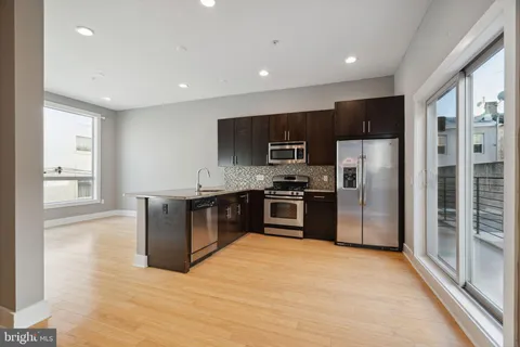 wooden floor and window in an empty room