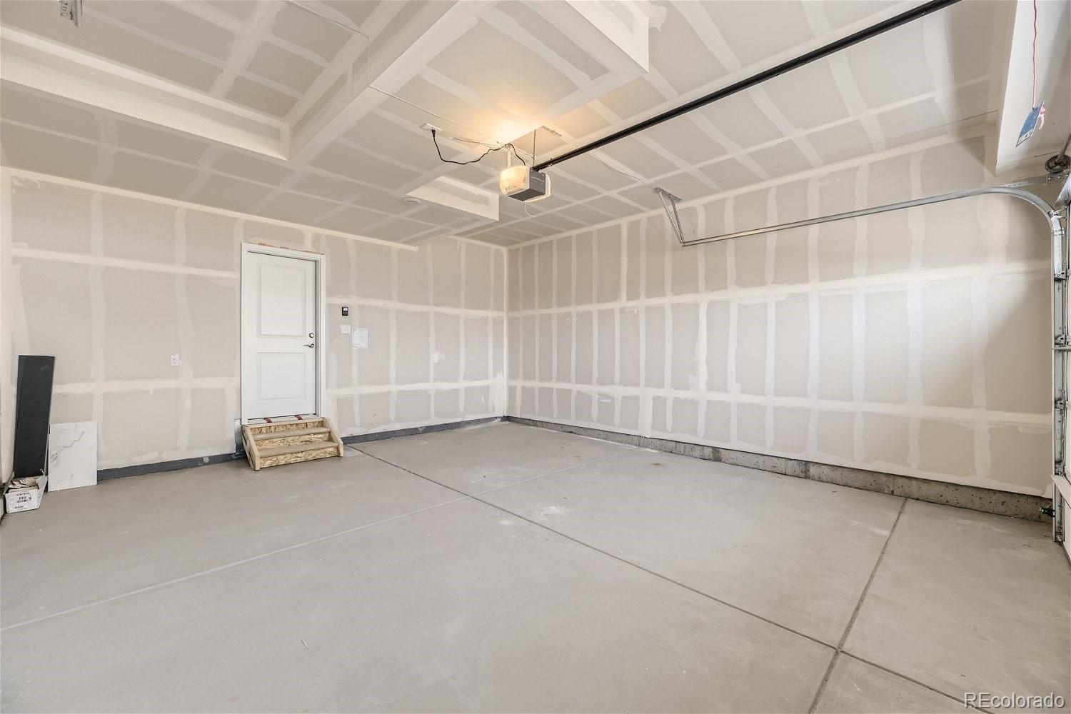 12659 Boggs Street Parker, CO 80134 - Photo 26 of 28 an empty room with a empty space and windows