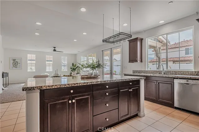 a kitchen with a sink and stove