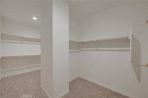 a bathroom with a sink double vanity and a mirror