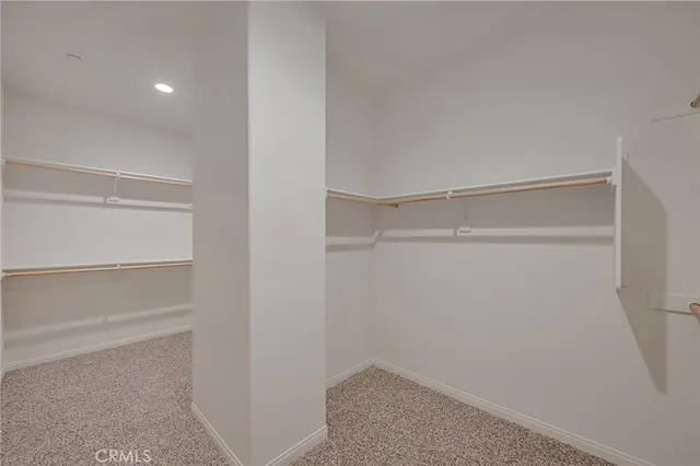 a bathroom with a sink double vanity and a mirror