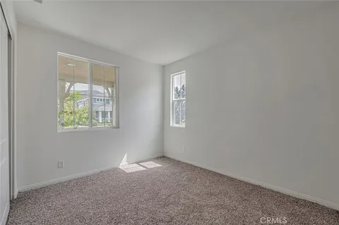 a view of an empty room and closet