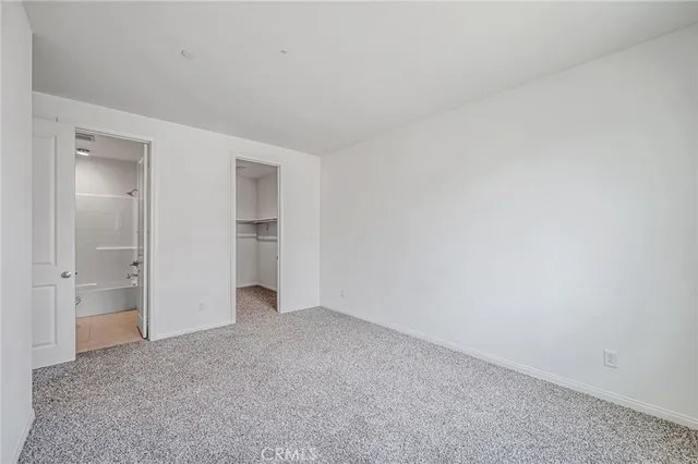 a view of hallway with windows