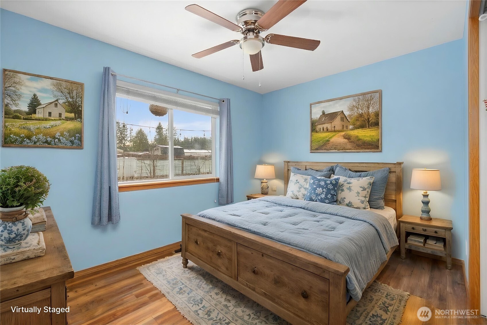 12808 East Macs Loop Road Granite Falls, WA 98252 - Photo 14 of 23 a bedroom with a bed and a painting on the wall