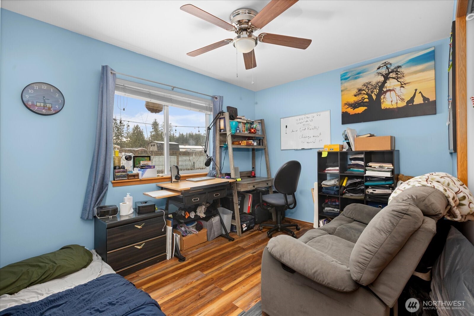 12808 East Macs Loop Road Granite Falls, WA 98252 - Photo 15 of 23 a work room with furniture and a flat screen tv