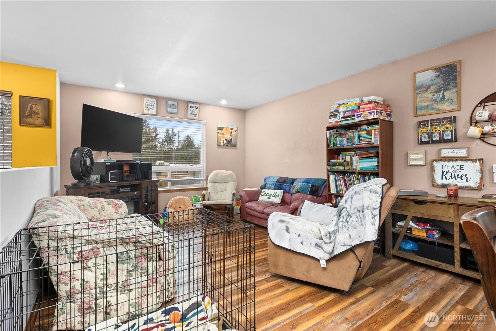 12808 East Macs Loop Road Granite Falls, WA 98252 - Photo 3 of 23 a living room with furniture and a flat screen tv