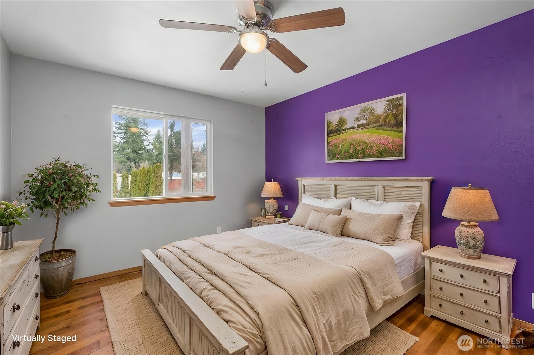 12808 East Macs Loop Road Granite Falls, WA 98252 - Photo 8 of 23 a bedroom with bed and a chandelier