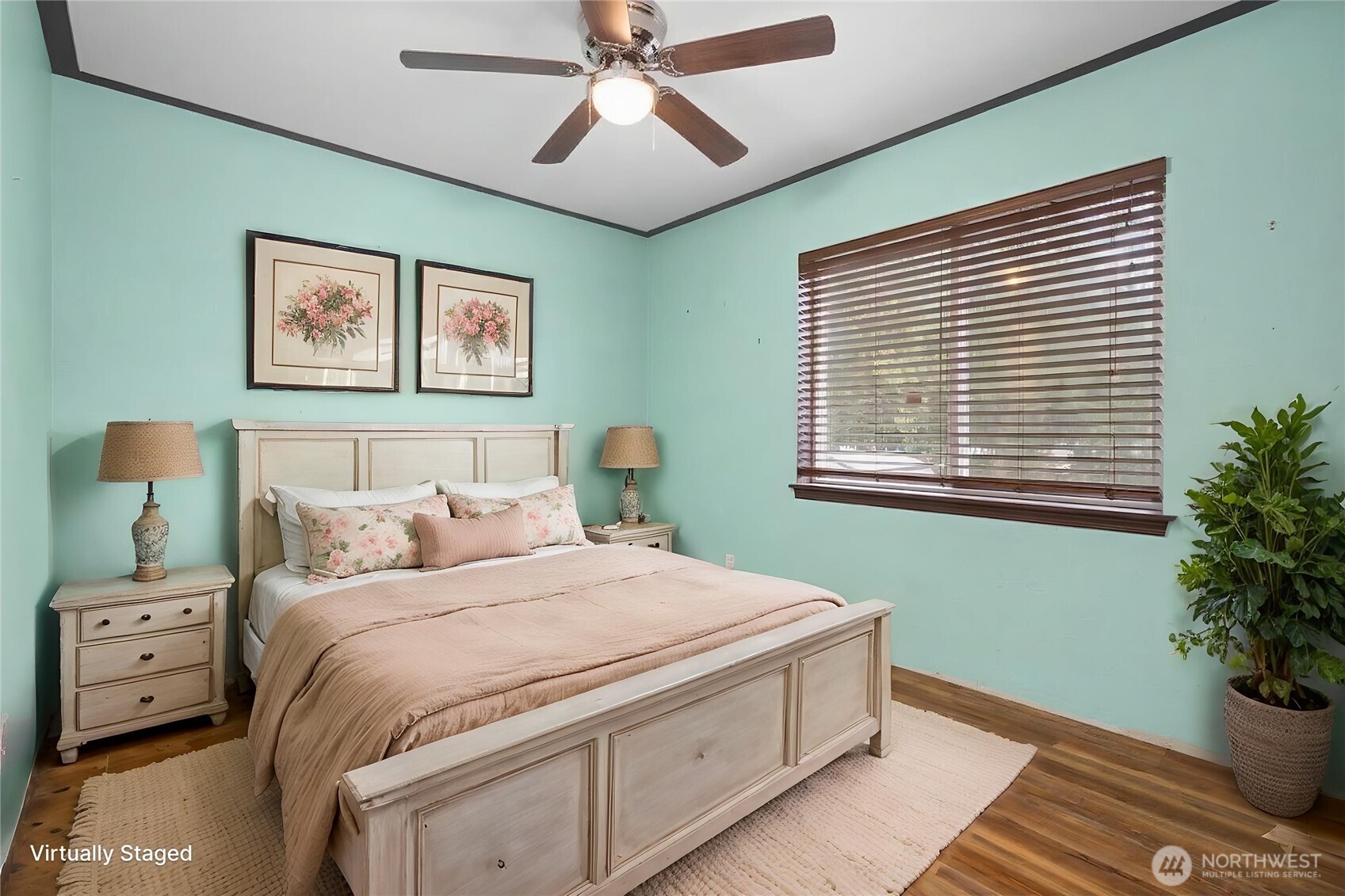 12808 East Macs Loop Road Granite Falls, WA 98252 - Photo 10 of 23 a bedroom with a bed and a potted plant