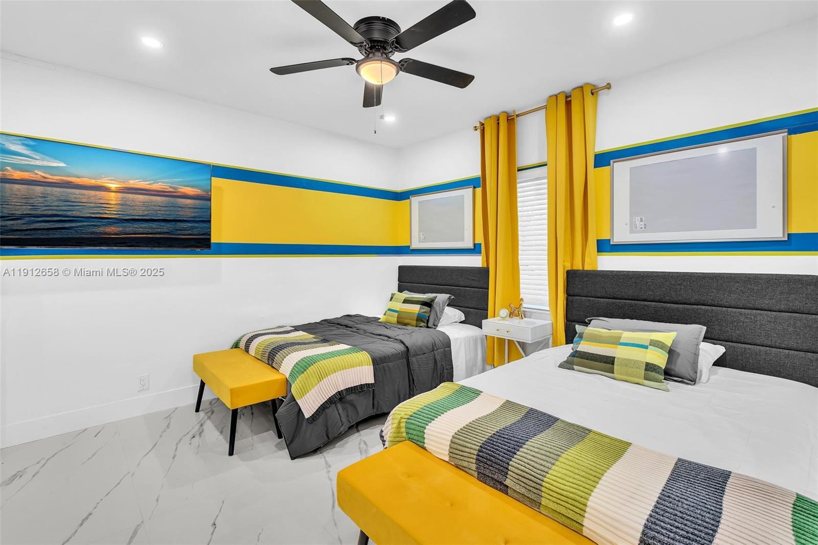 797 Northwest 35th Street Miami, FL 33127 - Photo 31 of 45 a bedroom with two beds and a window