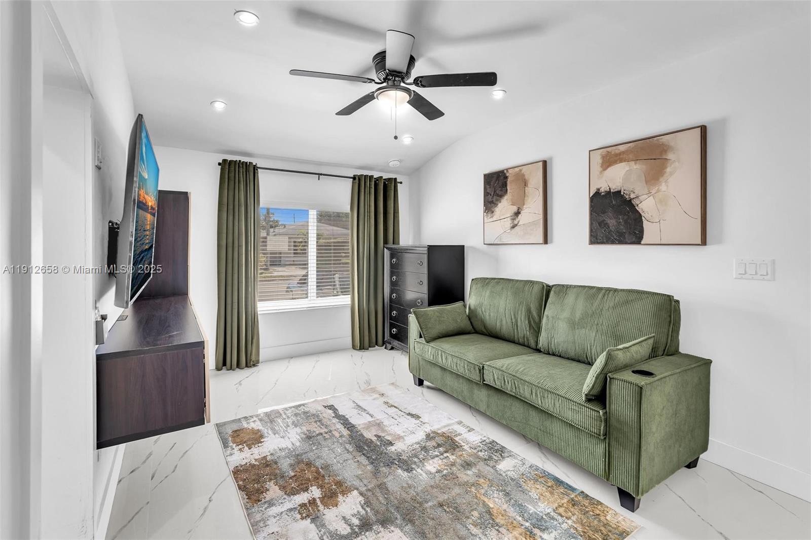 797 Northwest 35th Street Miami, FL 33127 - Photo 34 of 45 a living room with furniture and a window