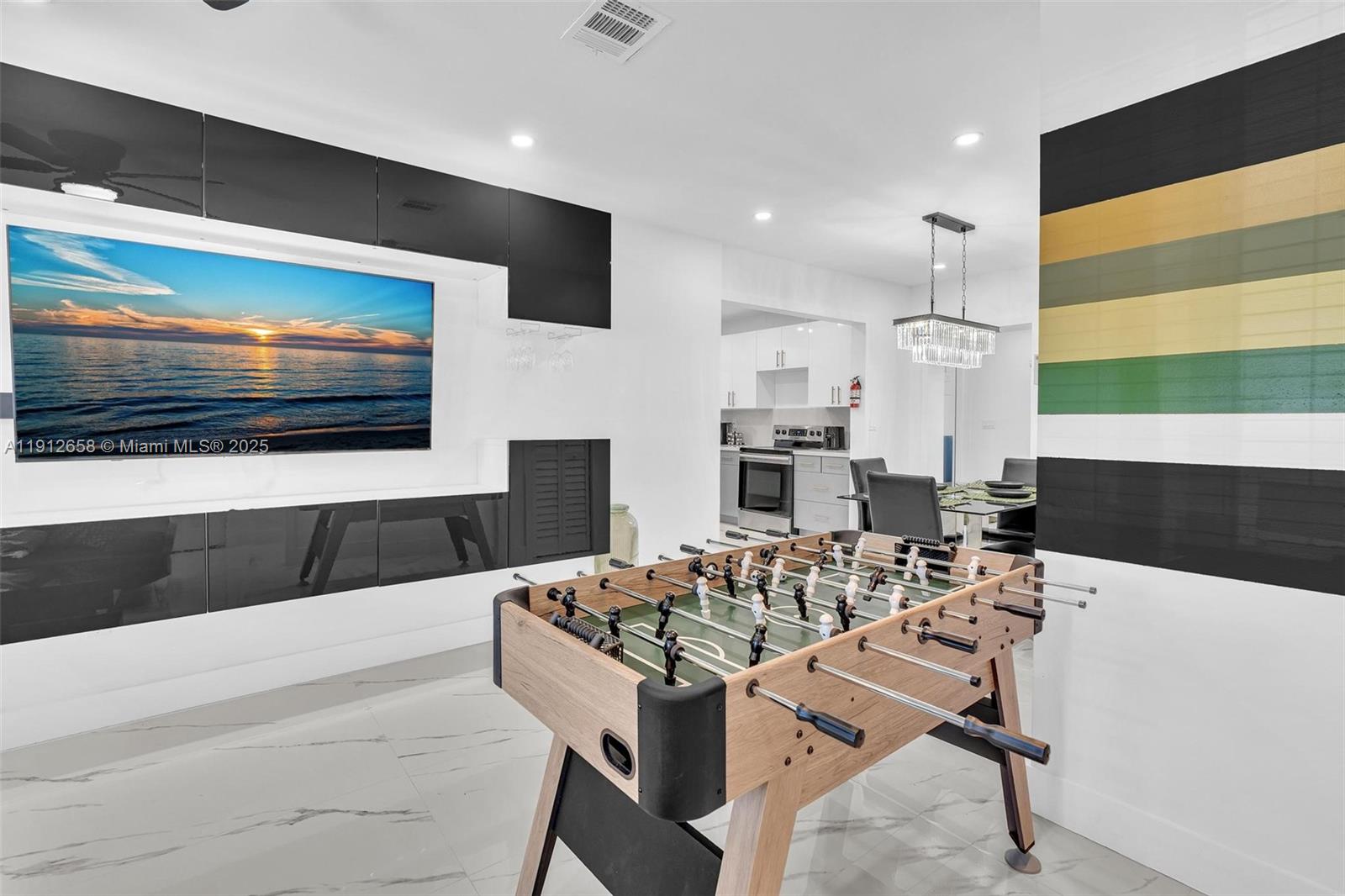 797 Northwest 35th Street Miami, FL 33127 - Photo 7 of 45 a view of a dining room with furniture