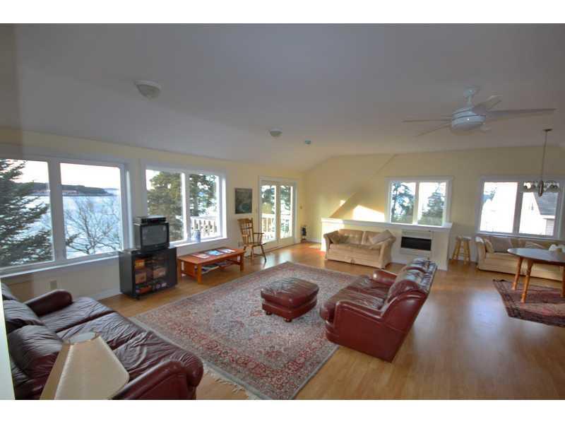 10 Pleasant River Road Addison, ME 04606 - Photo 29 of 35 Living Room. Stunning views looking...