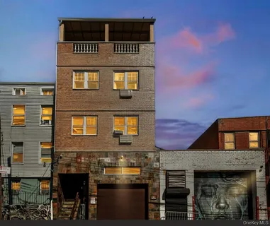 a front view of a building with glass windows