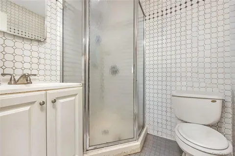 a view of a room that has a window in it