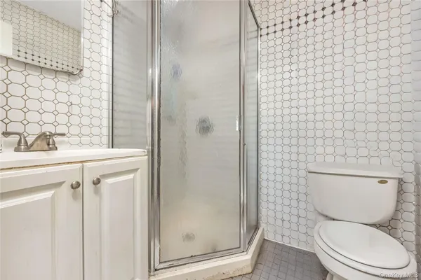 a view of a room that has a window in it