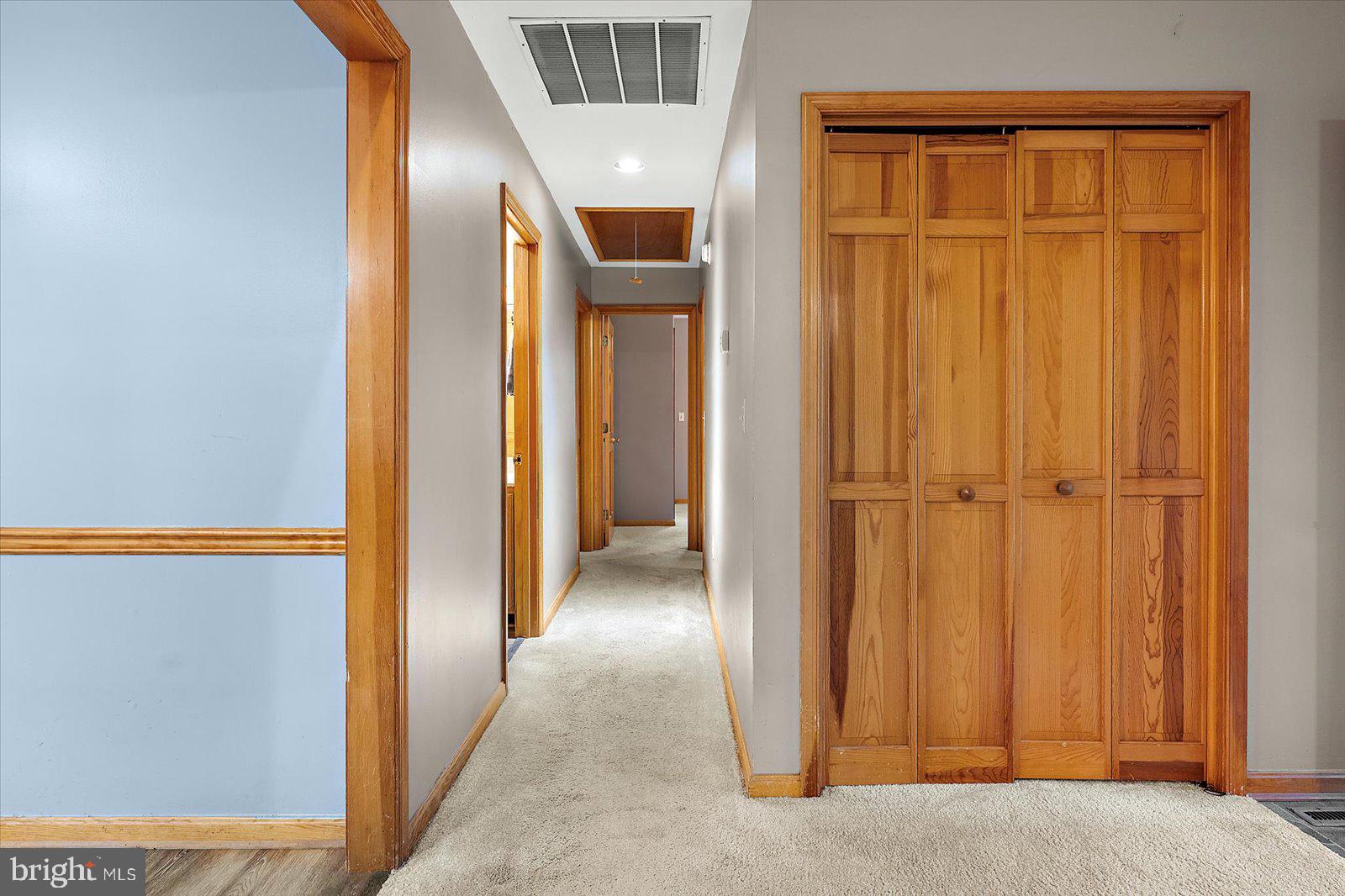 5079 Old Mill Branch Road Salisbury, MD 21801 - Photo 17 of 47 a view of a hallway with wooden floor and entryway