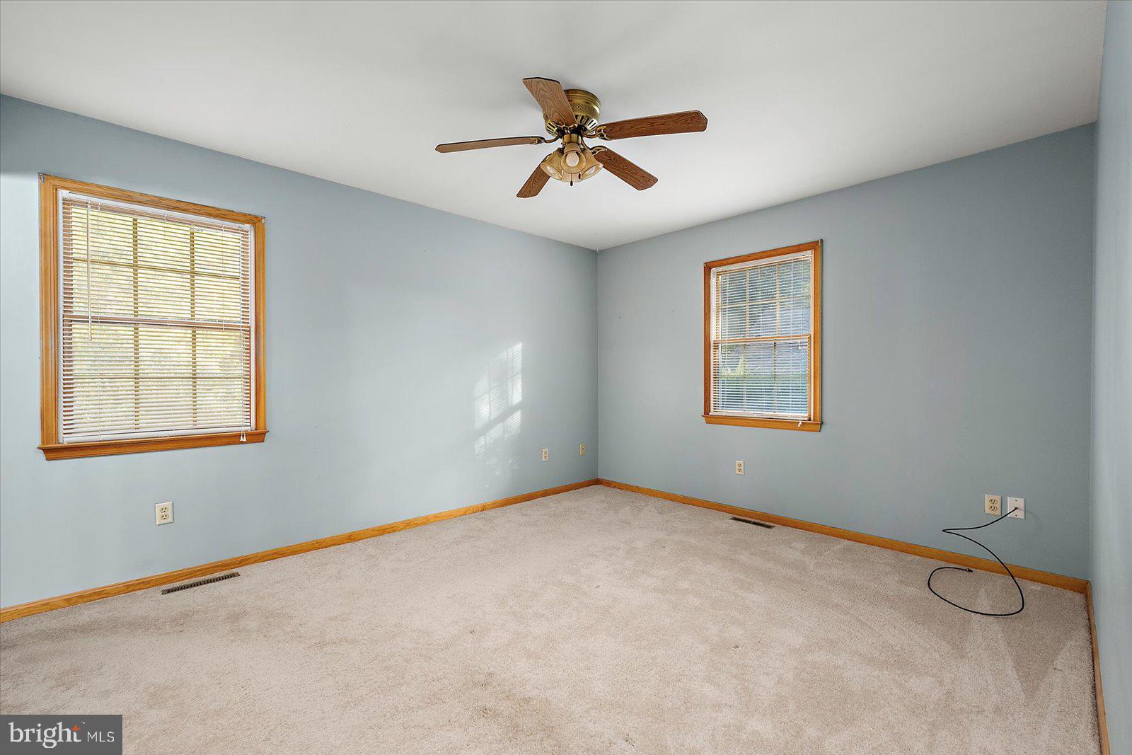5079 Old Mill Branch Road Salisbury, MD 21801 - Photo 18 of 47 a view of an empty room with a window