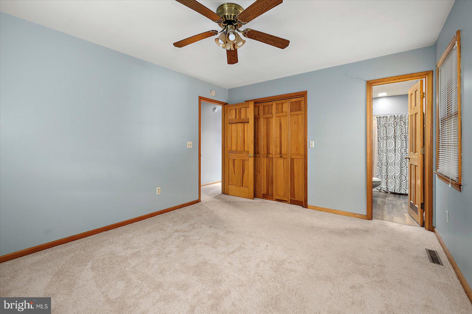 5079 Old Mill Branch Road Salisbury, MD 21801 - Photo 20 of 47 a view of a room with a ceiling fan