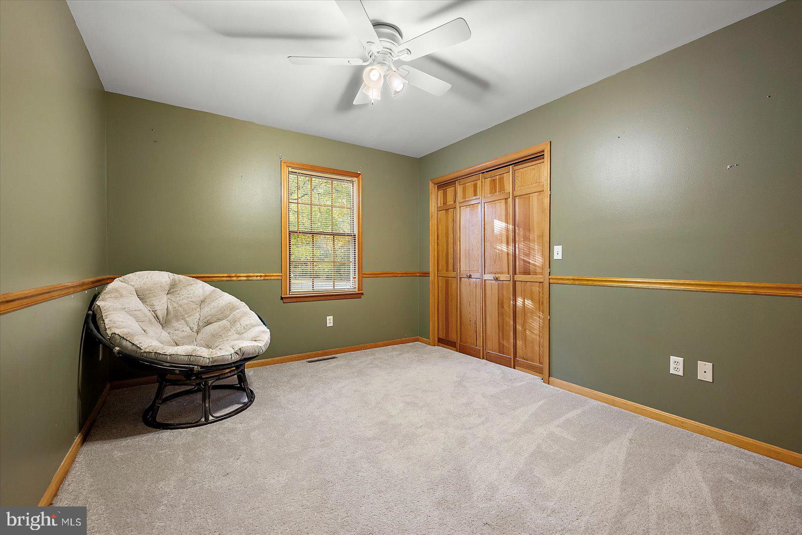 5079 Old Mill Branch Road Salisbury, MD 21801 - Photo 22 of 47 a view of a workspace with furniture and a window