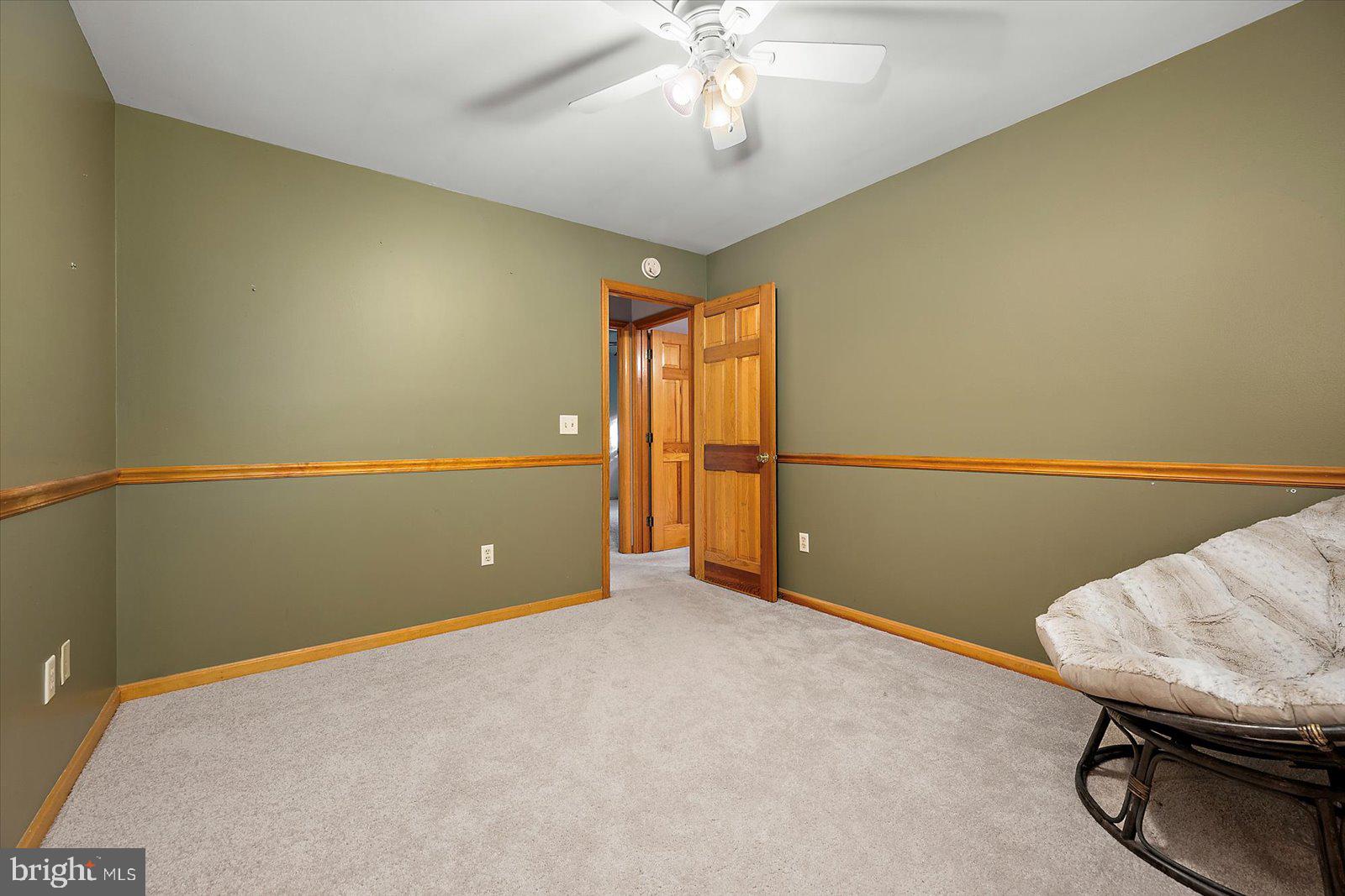 5079 Old Mill Branch Road Salisbury, MD 21801 - Photo 23 of 47 a view of an empty room with a window