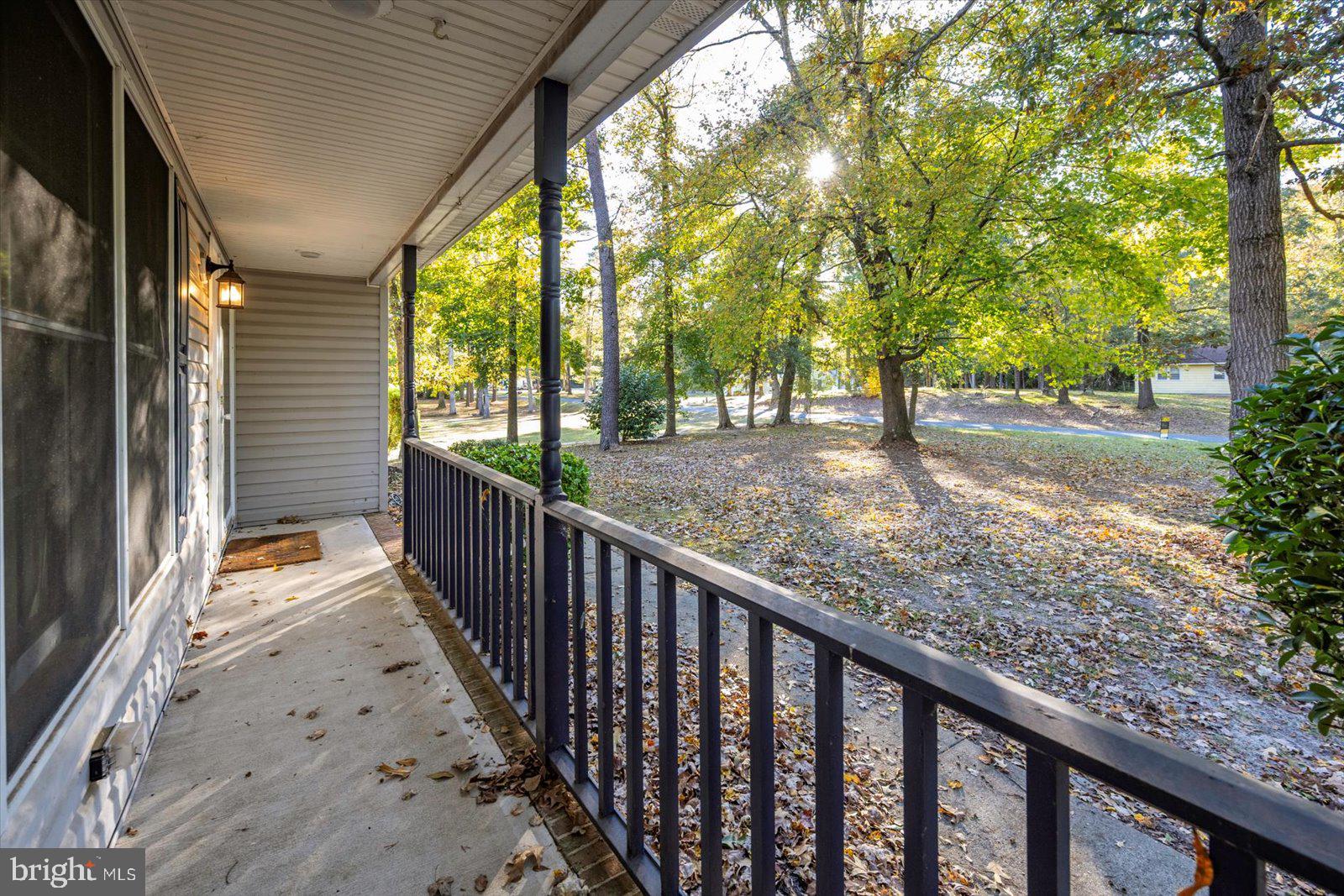 5079 Old Mill Branch Road Salisbury, MD 21801 - Photo 30 of 47 a view of a pathway with a wrought fence