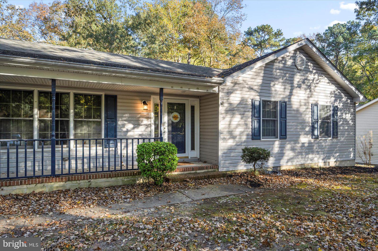 5079 Old Mill Branch Road Salisbury, MD 21801 - Photo 3 of 47 a front view of a house