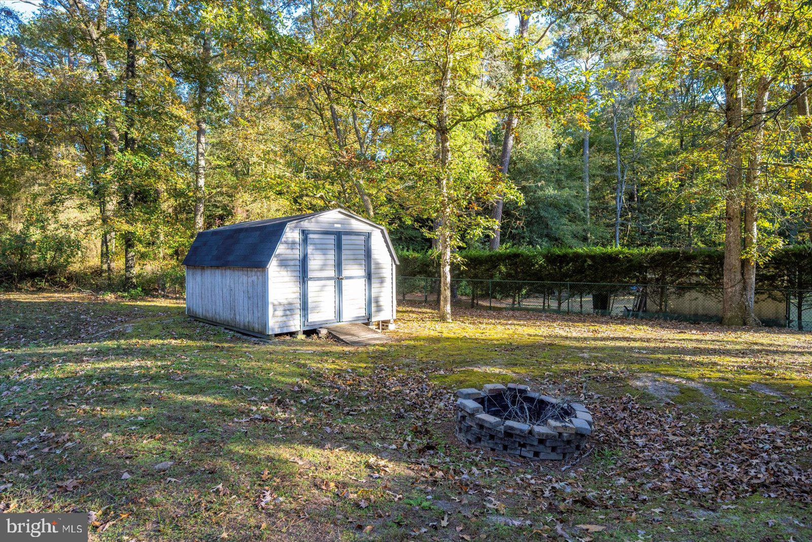 5079 Old Mill Branch Road Salisbury, MD 21801 - Photo 37 of 47 a view of a house with a yard